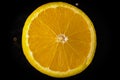 Slice of lemon in the center. Macro. Royalty Free Stock Photo