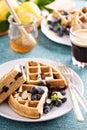 Lemon blueberry waffles with berries Royalty Free Stock Photo