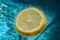 lemon with bubbles in soda glass Royalty Free Stock Photo