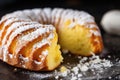 Lemon bundt cake (Babka) sprinkled with powdered sugar