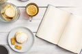 Lemon butter biscuits with lemon tea and an open book Royalty Free Stock Photo