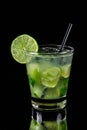 Lemon caipirinha on black background. Brazilian drink Royalty Free Stock Photo