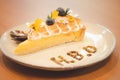 Lemon cheesecake one piece with message of H.B.D, Happy Birthday one year anniversary