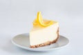 Lemon cheesecake on white plate Royalty Free Stock Photo