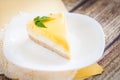 Lemon cheesecake on a white plate Royalty Free Stock Photo