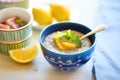 lemon chia pudding with lemon zest in a blue bowl