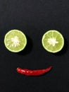 Lemon and chili and a smile face by arranging them. Royalty Free Stock Photo