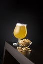 Lemon cider and bowl of peanuts Royalty Free Stock Photo