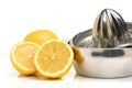 Lemon on citrus juicer Royalty Free Stock Photo