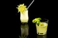 CAIPIRINHA OF LEMON WITH CHAMPAGNE A BRAZILIAN DRINK PHOTOGRAPHED IN BLACK BACKGROUND Royalty Free Stock Photo