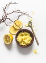 Lemon, coffee anti-cellulite scrub with natural ingredients, sea salt on a light background, top view. Skin care concept