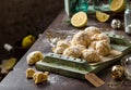 Lemon cookies with powdered sugar on green wooden board Royalty Free Stock Photo