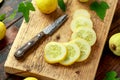 Lemon Cucumbers slices on wooden board. healthy food Royalty Free Stock Photo