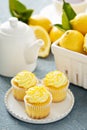 Lemon cupcakes with bright yellow frosting Royalty Free Stock Photo