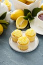Lemon cupcakes with bright yellow frosting Royalty Free Stock Photo