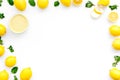 Lemon curd in bowl among lemons on white background top view copy space Royalty Free Stock Photo