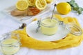 Lemon curd delicious and healthy dessert on a white yellow background. top view. flat lay Royalty Free Stock Photo