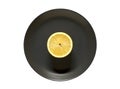 Lemon cut on round dark gray plate, isolated on white background with clipping path Royalty Free Stock Photo