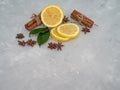 Lemon cut with lemon slices on a transparent plate, decorated with lemon leaves