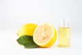 Lemon essential oil and lemon fruit isolate on white background Royalty Free Stock Photo