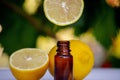 lemon essential oil and lemon fruit on a wooden white board Royalty Free Stock Photo