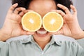 Lemon eyes, health and face of black woman in studio for nutrition, wellness and healthy snack. Food, diet and girl Royalty Free Stock Photo