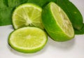 Lemon Fruit slices with lemon leaf isolated on white background.