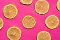 Lemon fruit slices on pink background flat lay Royalty Free Stock Photo