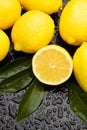 Lemon fruit on wet background