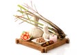 Lemon Grass, dried green leaves and herbal compress on a white background.