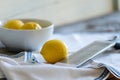 Three Lemons and Grater on White Cloth Royalty Free Stock Photo