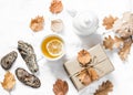 Lemon green tea, homemade gift, autumn mood on a light background, top view. Cozy autumn home still life.