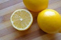 Lemon half and a two whole lemons top Royalty Free Stock Photo