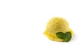 Lemon ice cream scoop decorated with mint leaves isolated on white background. Royalty Free Stock Photo