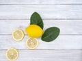 Lemon with leaves on white wooden Royalty Free Stock Photo