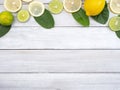 Lemon with leaves on white wooden Royalty Free Stock Photo