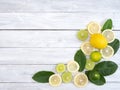 Lemon with leaves on white wooden Royalty Free Stock Photo