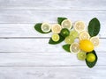 Lemon with leaves on white wooden Royalty Free Stock Photo