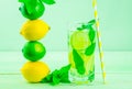 Lemon lime and mint drink cocktail with straw