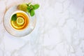 Lemon lime and mint tea on a marble background