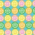 Lemon,lime ,orange, and grapefruit slices seamless on cyan backg