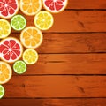 Lemon, lime, orange and grapefruit on wooden background