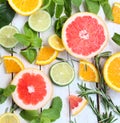 Lemon, lime and orange with mint and rosemary Royalty Free Stock Photo