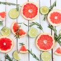 Lemon, lime and orange with mint and rosemary Royalty Free Stock Photo
