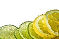 Lemon and lime slices in water Royalty Free Stock Photo