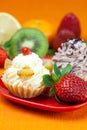 Lemon,mandarin,kiwi,cake and strawberries Royalty Free Stock Photo