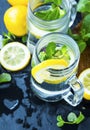 Lemon and mint infused water glasses.Fresh lemon slices with min Royalty Free Stock Photo