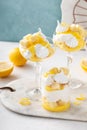 Lemon parfait or eton mess with lemon curd, meringue kisses and pound cake Royalty Free Stock Photo