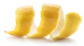 Lemon peel or lemon twist on white background. Close-up. Royalty Free Stock Photo