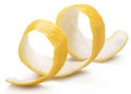 Lemon peel or lemon twist on white background. Close-up. Royalty Free Stock Photo